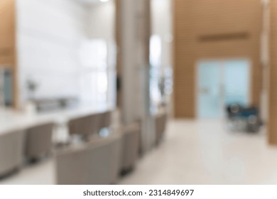 Blurred image background of corridor in hospital or clinic, counter information and sofa in waiting area near front of the examination room, nobody in image - Shutterstock ID 2314849697