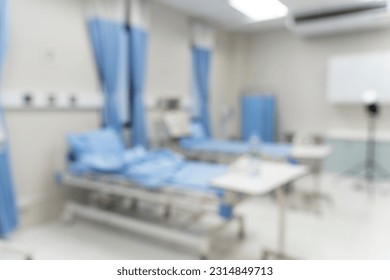 Blurred image background with Empty emergency room, intensive care room, intensive care unit, medical beds with equipment in hospital or clinic - Shutterstock ID 2314849713
