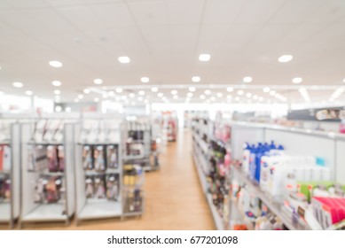 Blurred Image A Beauty Store With Variety Of Hair Salon Products On Display In US. Aisle, Shelf Of Hair Care Tools, Shampoo & Conditioner Treatment, Hair Color, Hair Styling Tools, Brushes And Combs