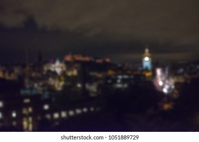 Blurred Image Bokeh Of Edinburgh Skyline At Night