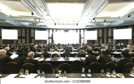 Blurred image of business people sitting in conference room for profession seminar meeting.