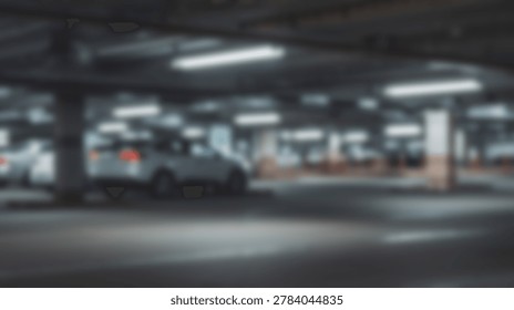A blurred image captures the interior of an underground parking garage, filled with parked cars and illuminated by overhead lights. The focus is soft, creating an atmospheric and abstract representation of urban infrastructure.