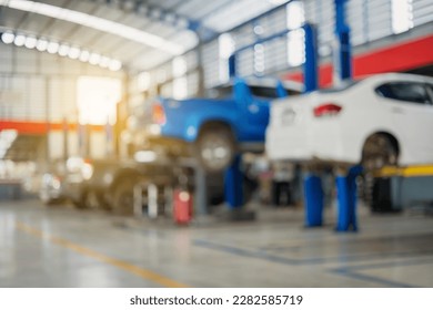 Blurred image of car inspection service center with modern tools - Shutterstock ID 2282585719