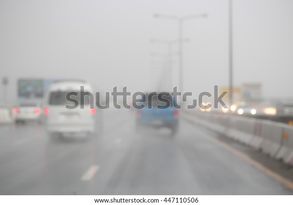 Blurred image car on the\
road.