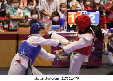 Blurred Image Of Children's Taekwondo Competition In Stadium.