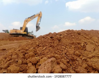 Blurred image of clay moving work. With heavy machinery