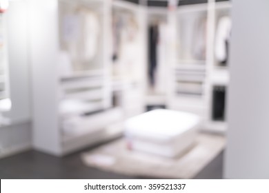 Blurred Image Of Closet Room For Background Uses.