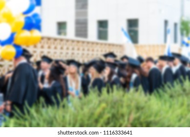 Blurred image College students at Graduation Ceremony.Group happy multiple races students in mortar boards and bachelor gowns outdor. - Shutterstock ID 1116333641