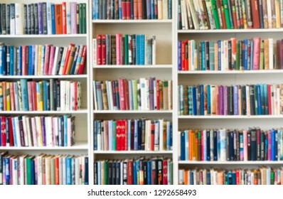 Blurred Image Of Colorful Bookshelf In Secondhand Shop