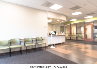 Blurred Image Empty Lobby/front Desk Area Of Clinical Laboratory Services Office. Kiosk Tablet For Customer Check-in On Upon Arrival. Test Center For Diagnostic Testing, Medical Abstract Background.