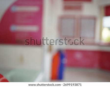 blurred image of empty post office interior.