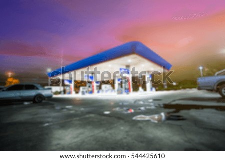 blurred Image of gas station at twilight