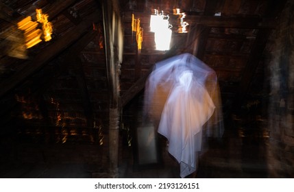 blurred image of ghost in the attic haunted house for Halloween