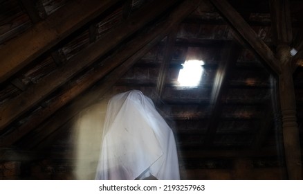 blurred image of ghost in the attic haunted house for Halloween