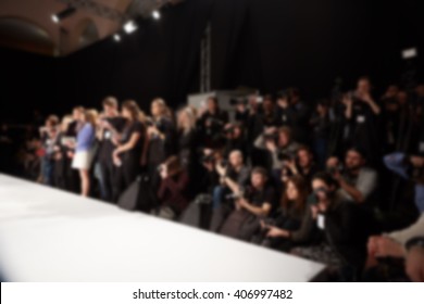 Blurred Image Of Group Audience At Fashion Show Stage