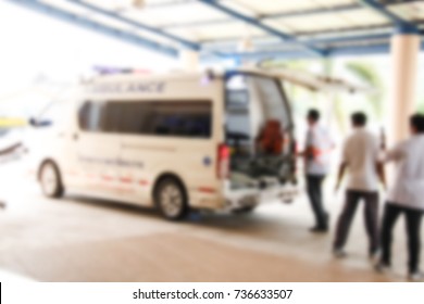 blurred image of hospital, medical worker moving patient on gurney take to the emergency.