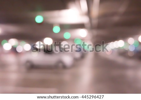 blurred image of indoor parking lot.