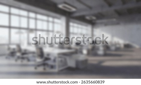 Blurred Image of Large Open Plan Office with Desks, Chairs, and Big Windows