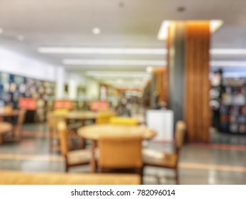 Blurred Image Of Library Room, Study Room With Book Shelves For Education, Learning Centre Where Knowledge Sharing. Vintage Color Filter And Sun Light, Background Design. No People.