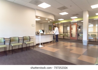 Blurred Image Lobby/front Desk Area Of Clinical Laboratory Services Office. Customer Check-in On Kiosk Tablet Upon Arrival. Test Center For Diagnostic Testing, Medical, Healthcare Abstract Background