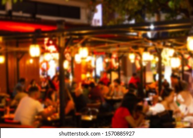 Blurred Image Lots Of People Enjoy At The Bar Pub Fun Of Night Festival In A Restaurant And The Atmosphere Is Party Happy And Relaxing.