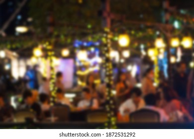 Blurred Image Lots Of People Enjoy At The Bar Pub Fun Of Night Festival In A Restaurant And The Atmosphere Is Party Happy And Relaxing.