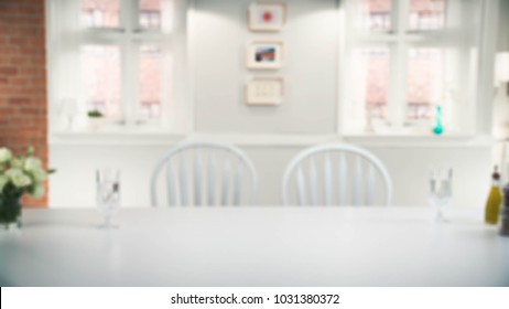 blurred image of modern dinning table - Shutterstock ID 1031380372