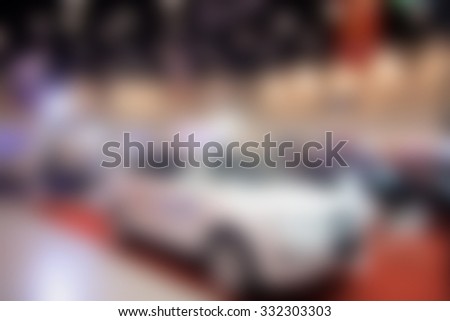 blurred image of motor show,show room,motor expo for background