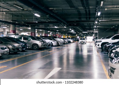 Blurred Image Parking Garage In The Mall For Background.