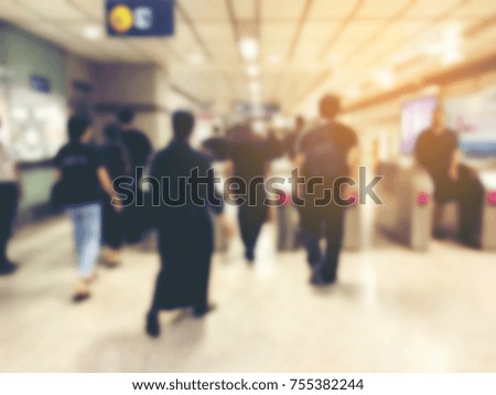 blurred image of passenger waiting  in line (queue) for their respective public transport during rush hour, Stay in the crowd cause stress in everyday life. vintage and film effect.