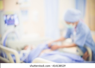 Blurred Image Of A Patient In Critical Condition In The ICU Ward.