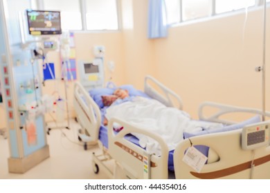 Blurred Image Of A Patient In Critical Condition In The ICU Ward.