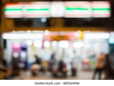 Blurred Image Of People In Front Of The Convenience Store At Night