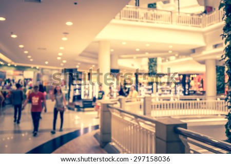 blurred image of people in shopping mall vintage style
