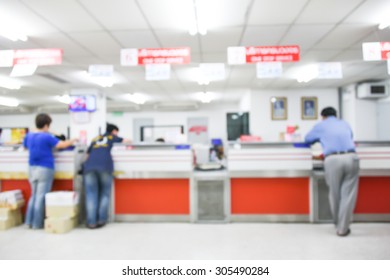 Blurred Image Of Post Office Interior And People - Customer Service