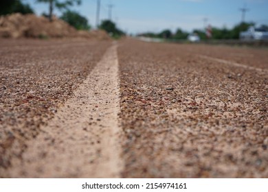 Blurred image, road pavement to support paved roads