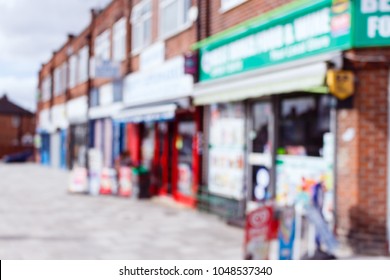 Blurred Image Of A Row Of Small Convenience Shops, Corner Stores In A Residential Area, London, UK.