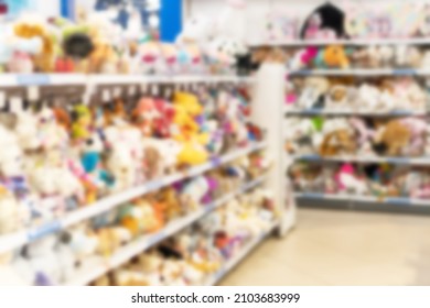 Blurred  Image Of Shelves With Stuffed Toys In A Toy Shop.