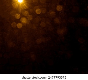 blurred image. shiny sun, sunbeams, sunrays, sunshine design. Yellow orange warm light effect, sun rays, golden beams isolated on black background. star dust