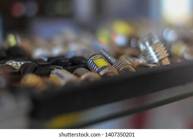 Blurred Image Of Shop Window And Auto Parts Store Shelves. Abstract Interior Of Retail Store.