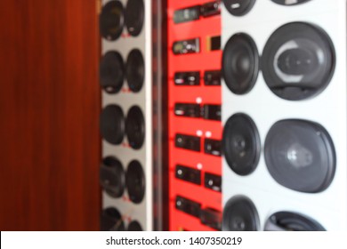 Blurred Image Of Shop Window And Auto Parts Store Shelves. Abstract Interior Of Retail Store.