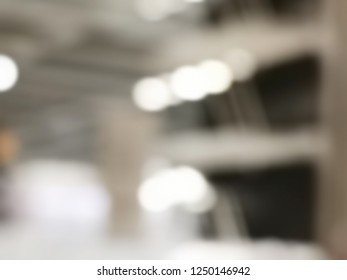 Blurred image of shopping mall with shining lights - Shutterstock ID 1250146942