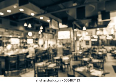 Blurred Image Sport And Gumbo, Oyster Bar With TV, Classic Counter, Tables And Chairs In Houston, Texas, US. Bar Happy Hour, Dine In Abstract Background. Night Club, Grill Bar Concept. Vintage Filter.