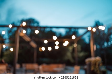 Blurred image of the terrace interior with garland lights. Abstract image.  - Shutterstock ID 2165181951