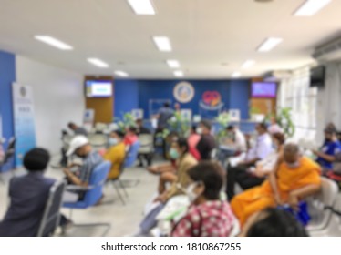 Blurred image of Thai people waiting to line up for tax.