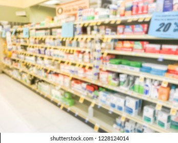 Blurred Image Variation Of Vitamin And Supplement On Shelves Display With Discounted Price Tags At Grocery Store In Texas, America.