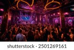 Blurred image of a vibrant nightclub scene with a large crowd dancing under colorful lights, capturing the energy and excitement of a night out