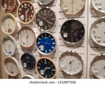 The blurred image of Wall clocks in a variety of styles and a variety of patterns