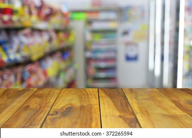 Blurred Image Wood Table And Abstract Minimart Convenience Store