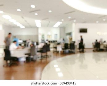 Blurred Image Of Workers At Open Office Environment 